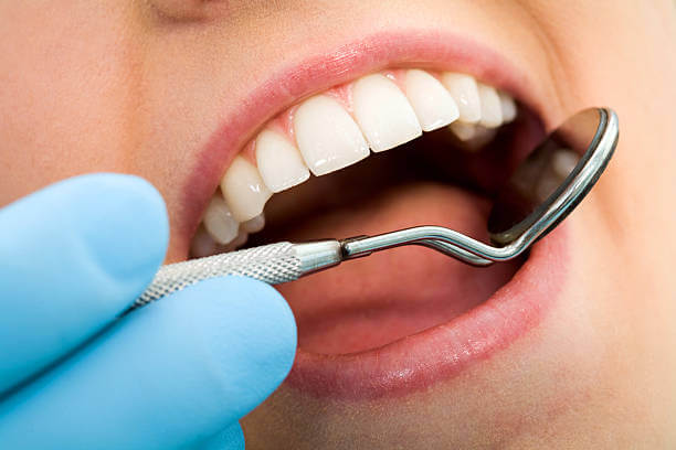 Patient with a healthy, cavity-free smile after a dental check-up.
